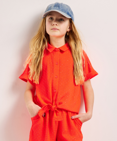 crinkle blouse glitters en knoopdetail